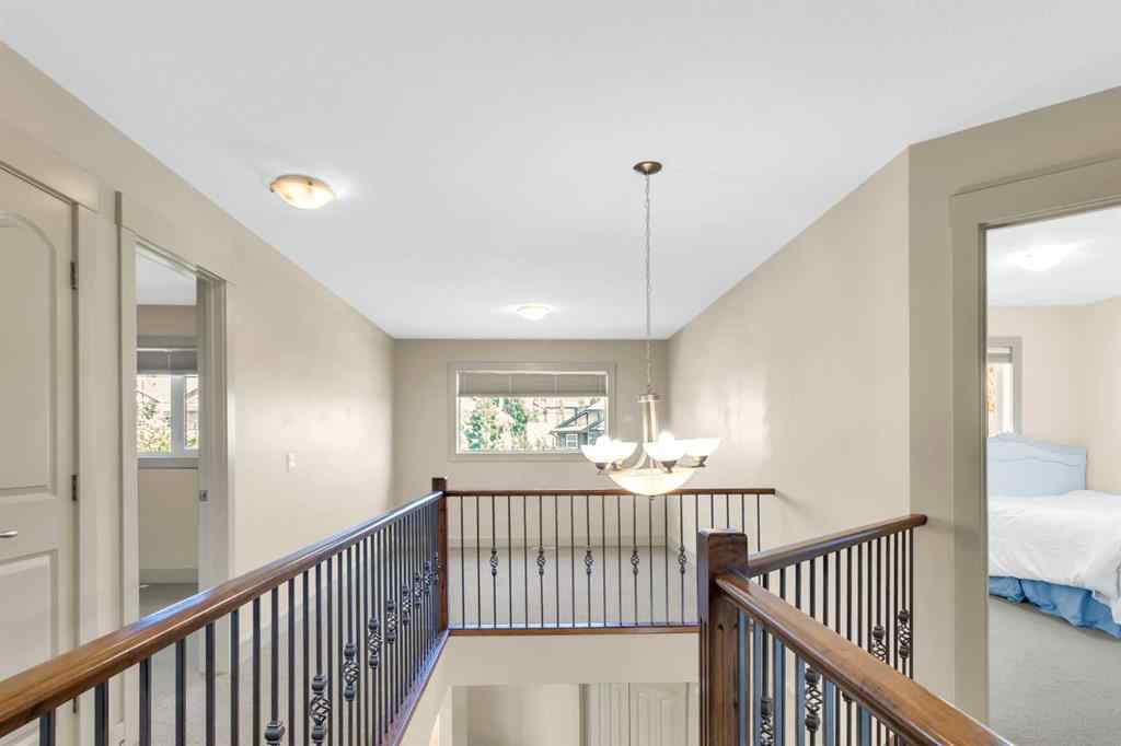 MLS® A2246175 - 68 Elmont Court SW in Springbank Hill Calgary, Residential