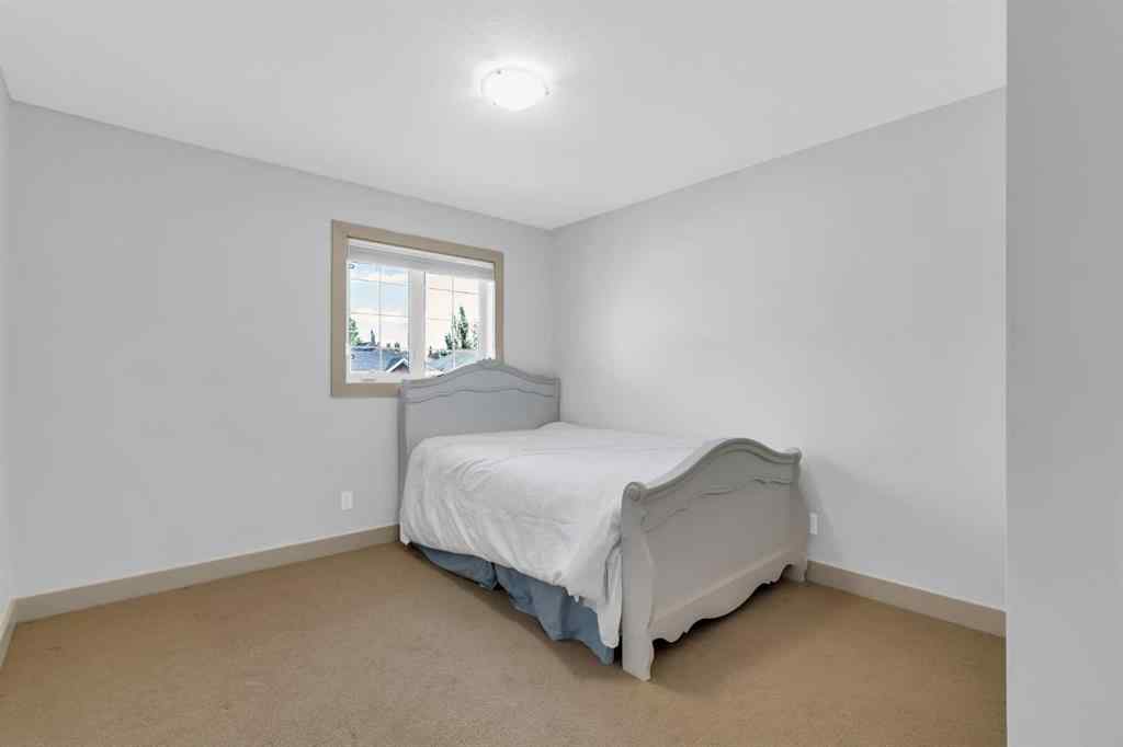 MLS® A2246175 - 68 Elmont Court SW in Springbank Hill Calgary, Residential