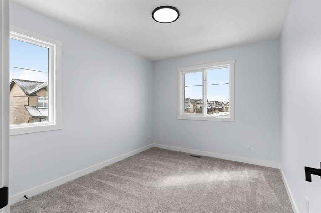 MLS® A2246184 - 617 Baywater Manor SW in Bayside Airdrie, Residential