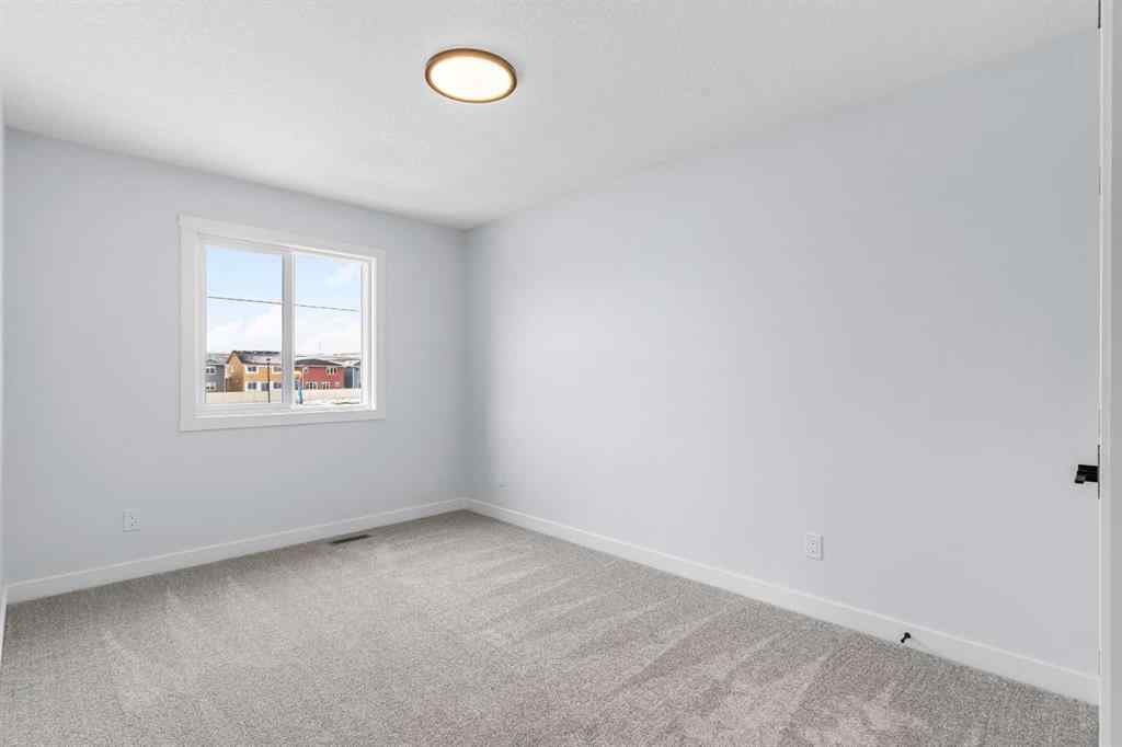 MLS® A2246184 - 617 Baywater Manor SW in Bayside Airdrie, Residential