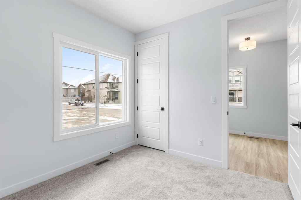 MLS® A2246184 - 617 Baywater Manor SW in Bayside Airdrie, Residential