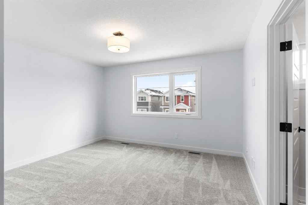 MLS® A2246184 - 617 Baywater Manor SW in Bayside Airdrie, Residential
