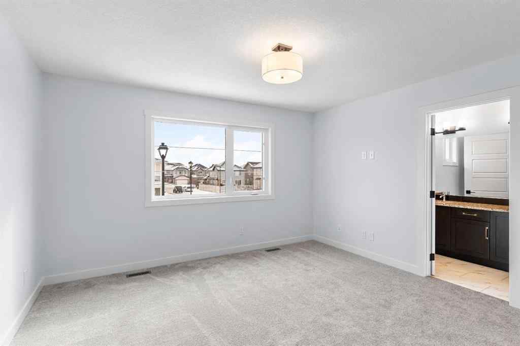 MLS® A2246184 - 617 Baywater Manor SW in Bayside Airdrie, Residential