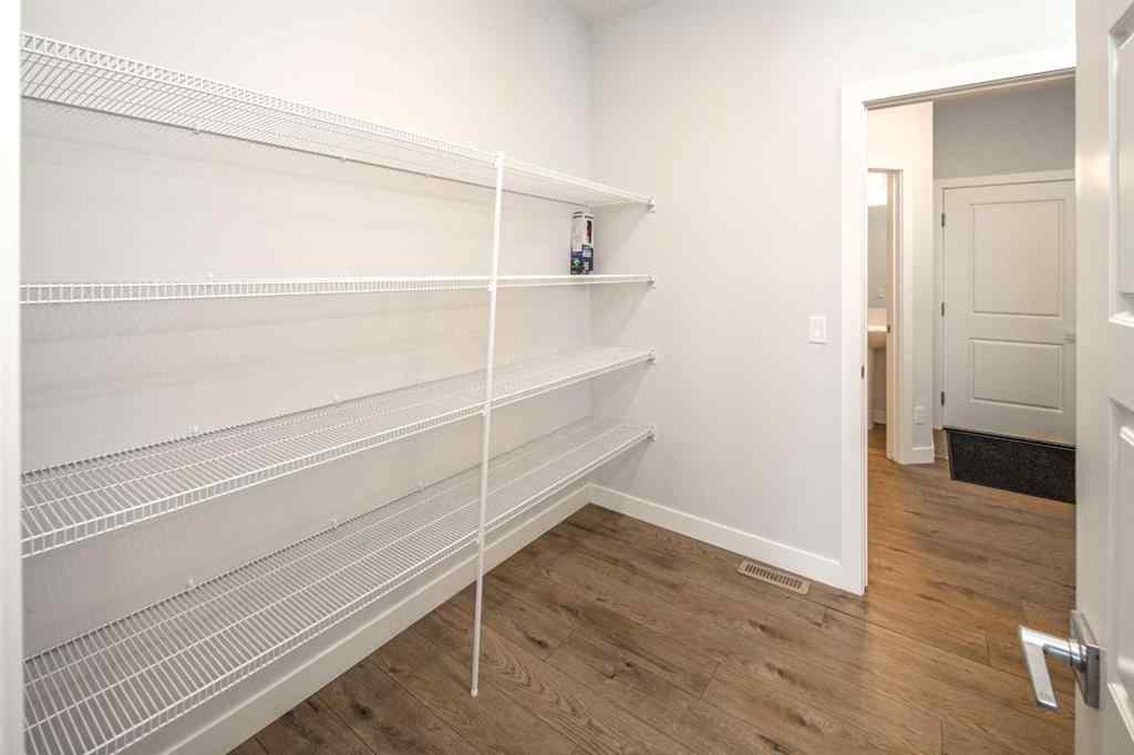 MLS® A2246192 - 159 Ambleside Crescent NW in Moraine Calgary, Residential