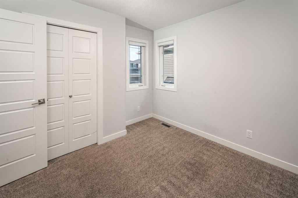 MLS® A2246192 - 159 Ambleside Crescent NW in Moraine Calgary, Residential