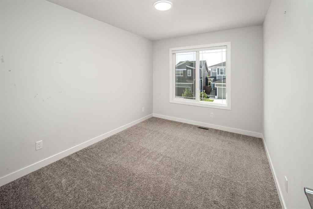MLS® A2246192 - 159 Ambleside Crescent NW in Moraine Calgary, Residential