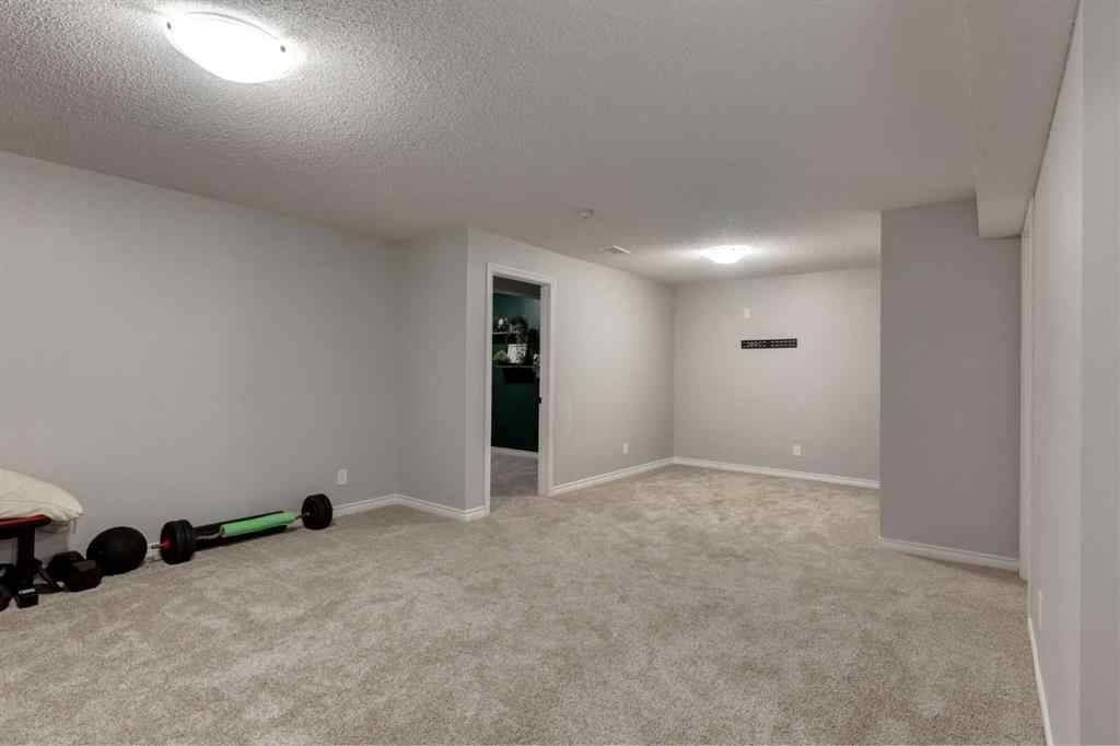 MLS® A2246204 - 65 Brightondale Green SE in New Brighton Calgary, Residential