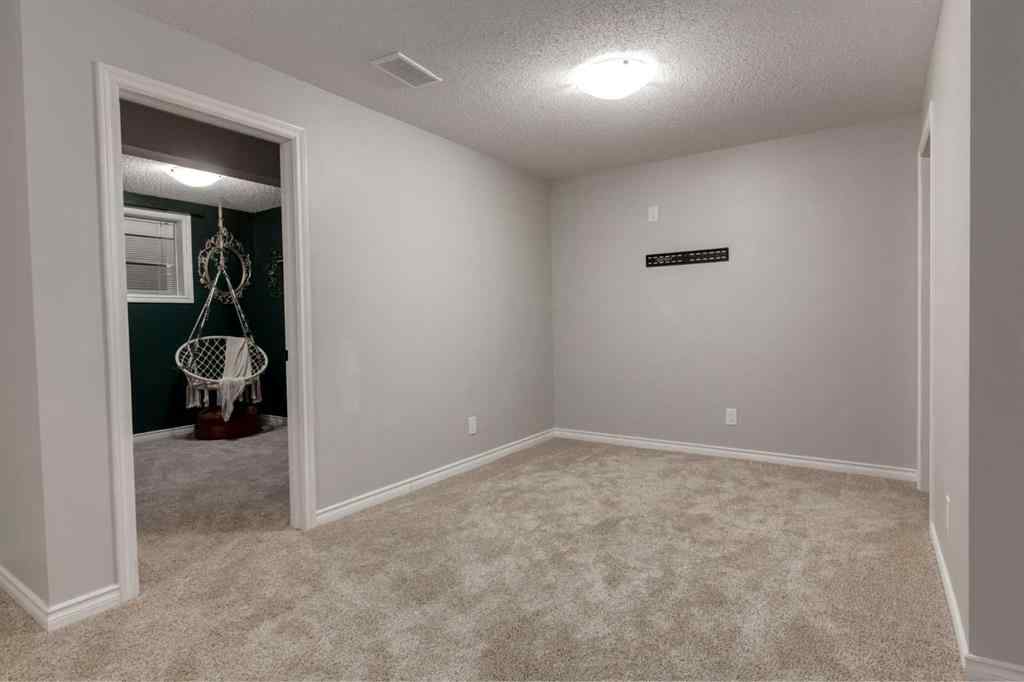 MLS® A2246204 - 65 Brightondale Green SE in New Brighton Calgary, Residential