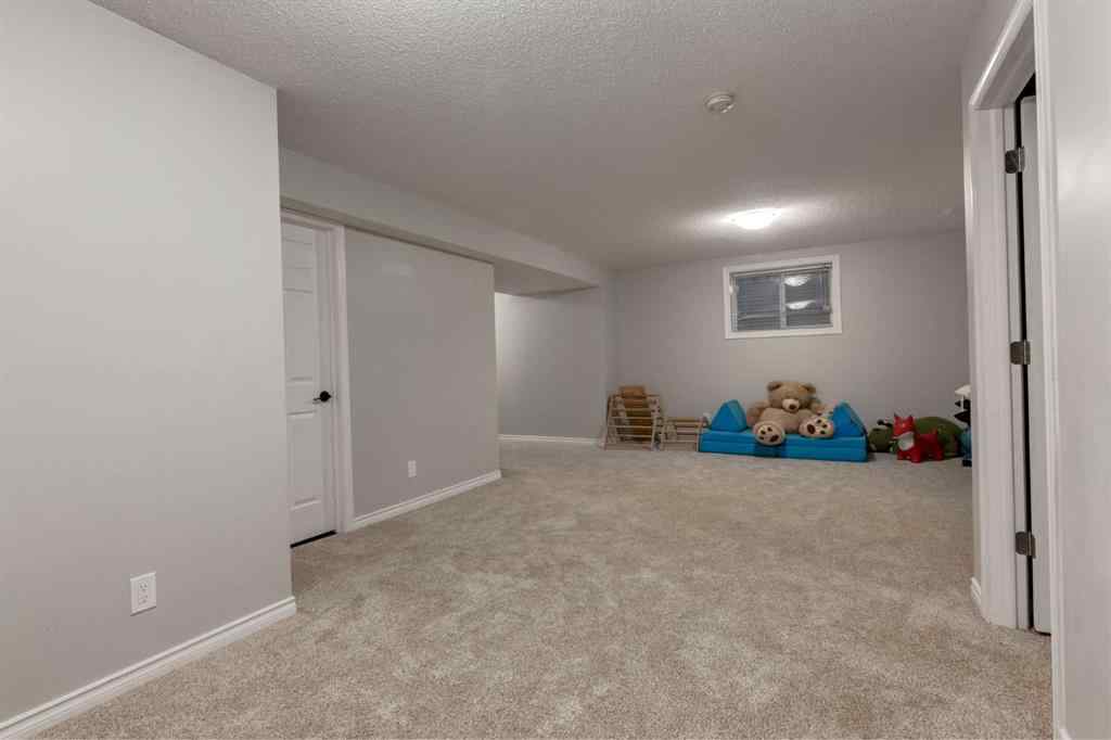 MLS® A2246204 - 65 Brightondale Green SE in New Brighton Calgary, Residential