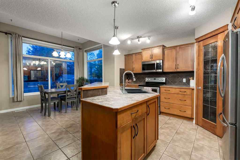 MLS® A2246204 - 65 Brightondale Green SE in New Brighton Calgary, Residential