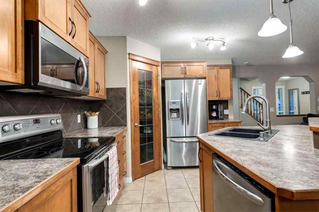 MLS® A2246204 - 65 Brightondale Green SE in New Brighton Calgary, Residential