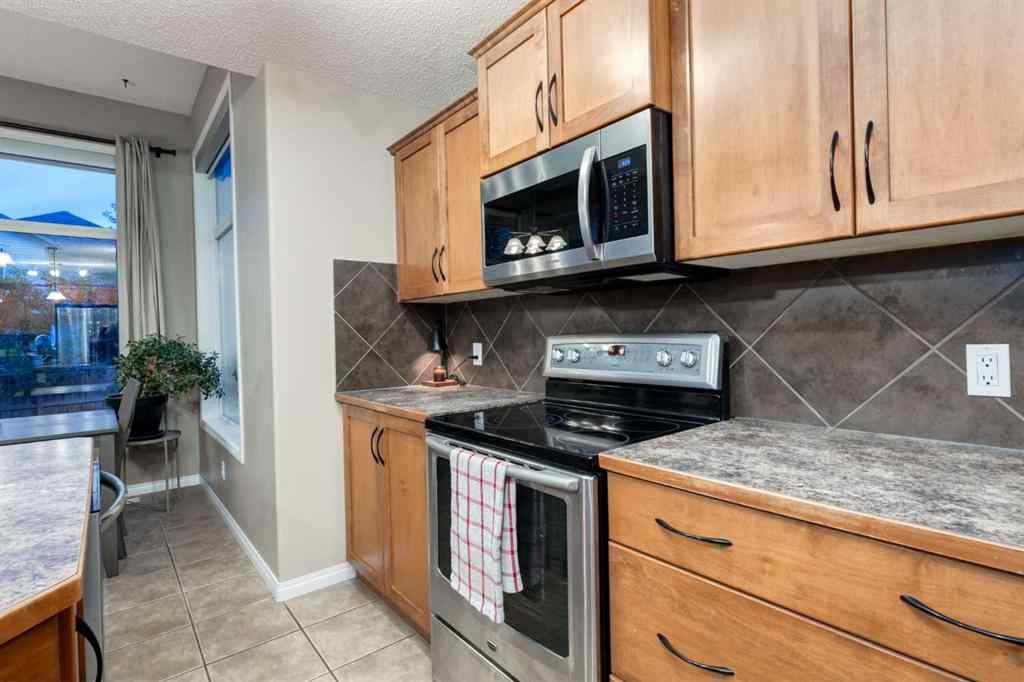 MLS® A2246204 - 65 Brightondale Green SE in New Brighton Calgary, Residential