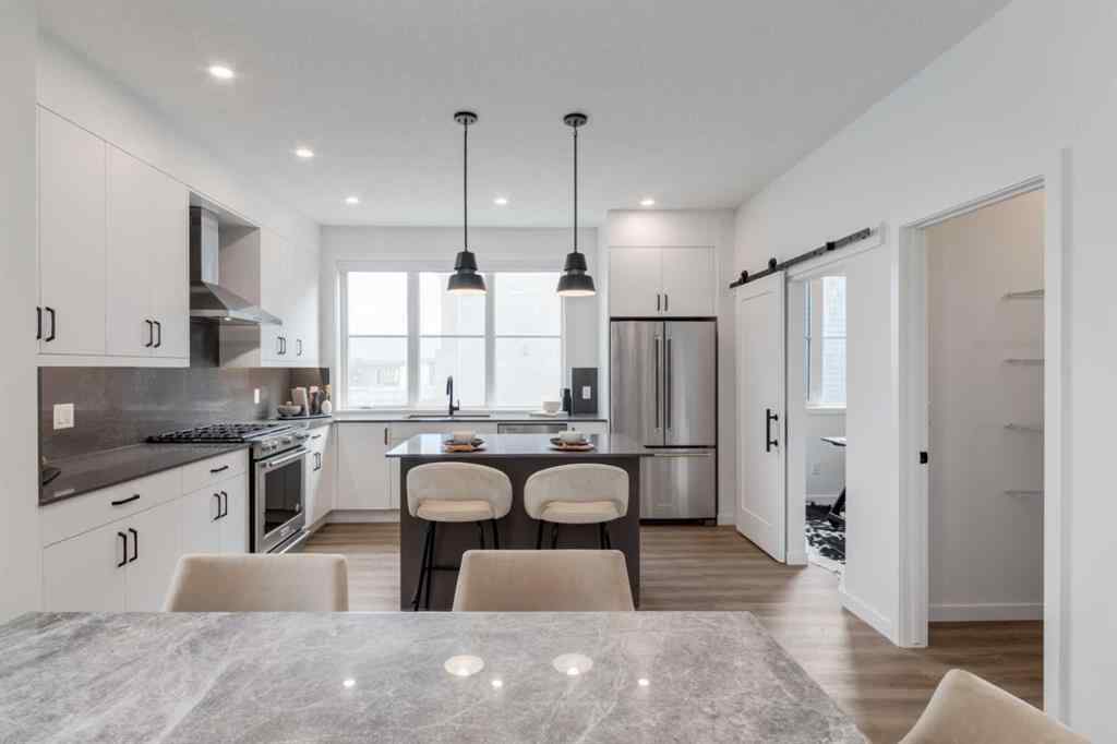 MLS® A2246241 - Unit #13 1453 Na'a Drive SW in Medicine Hill Calgary, Residential