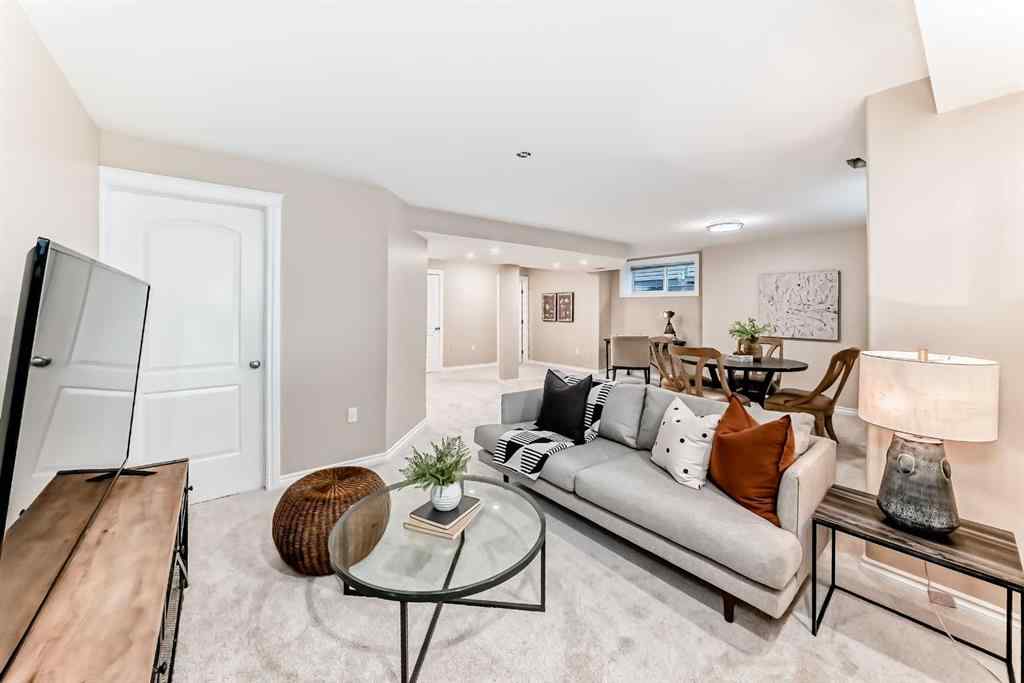 MLS® A2246251 - Unit #105 100 Coopers Common SW in Coopers Crossing Airdrie, Residential