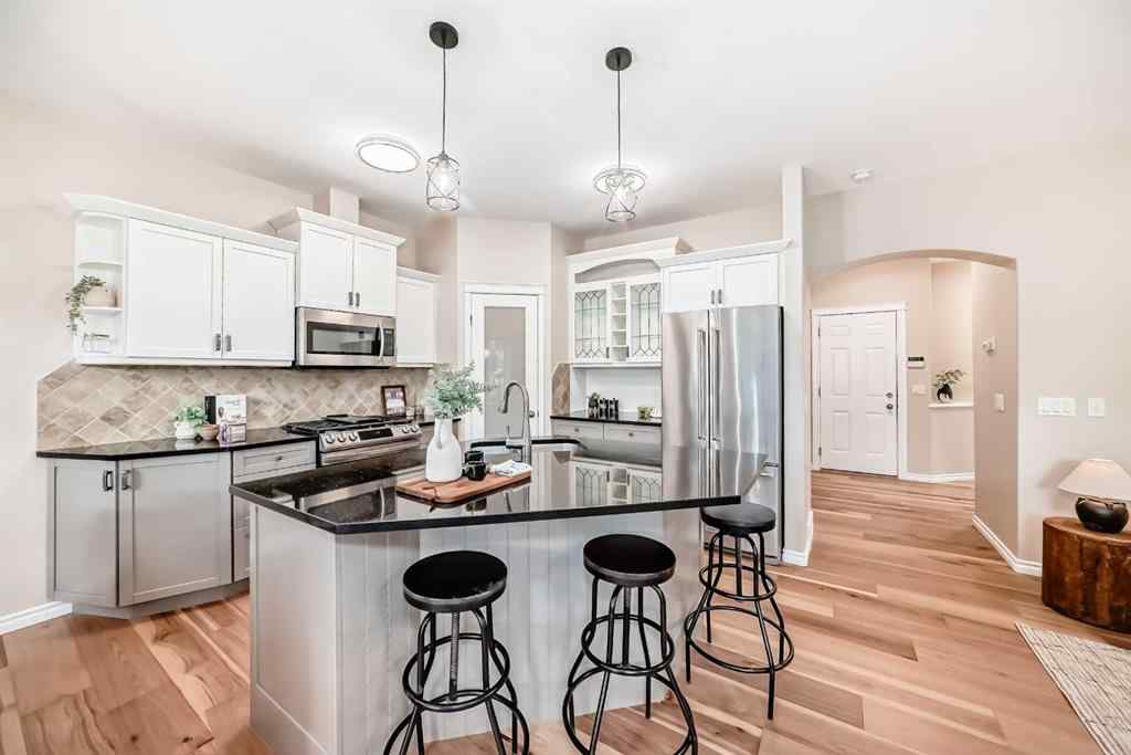 MLS® A2246251 - Unit #105 100 Coopers Common SW in Coopers Crossing Airdrie, Residential