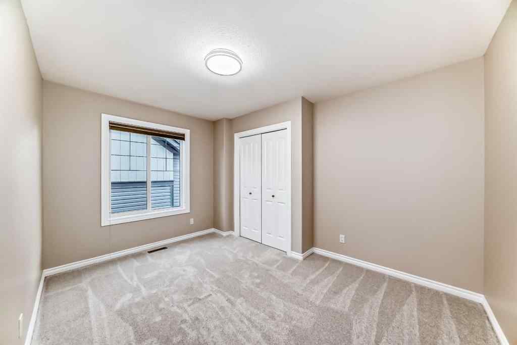 MLS® A2246251 - Unit #105 100 Coopers Common SW in Coopers Crossing Airdrie, Residential
