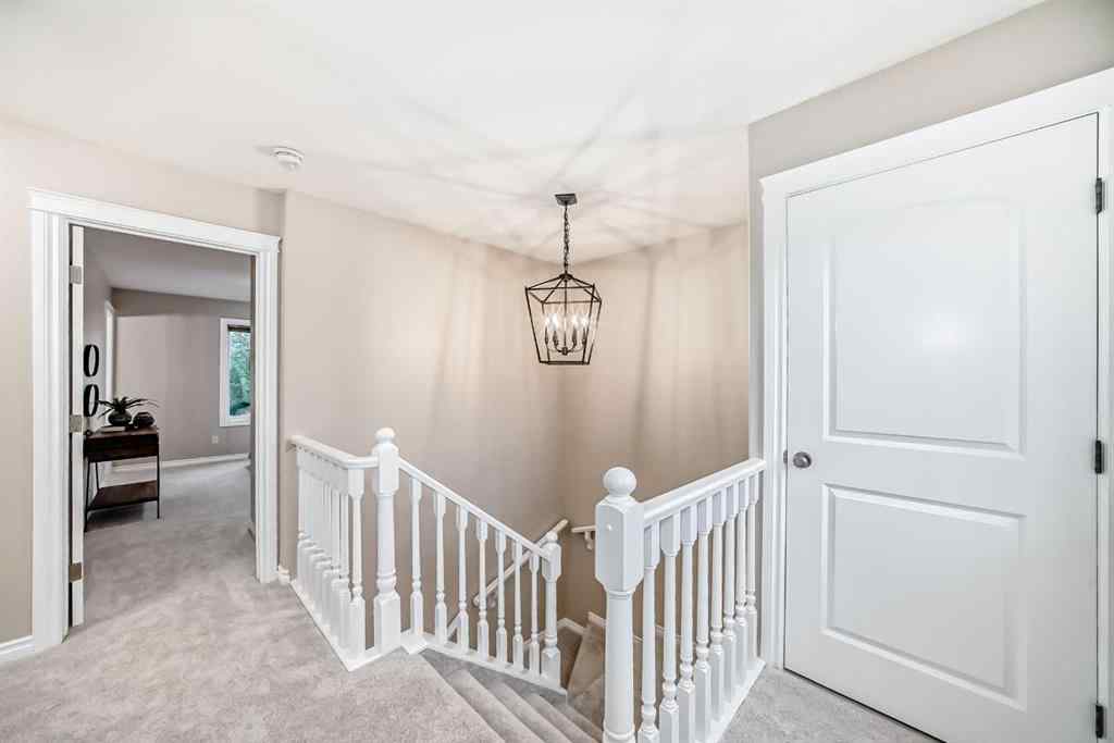 MLS® A2246251 - Unit #105 100 Coopers Common SW in Coopers Crossing Airdrie, Residential