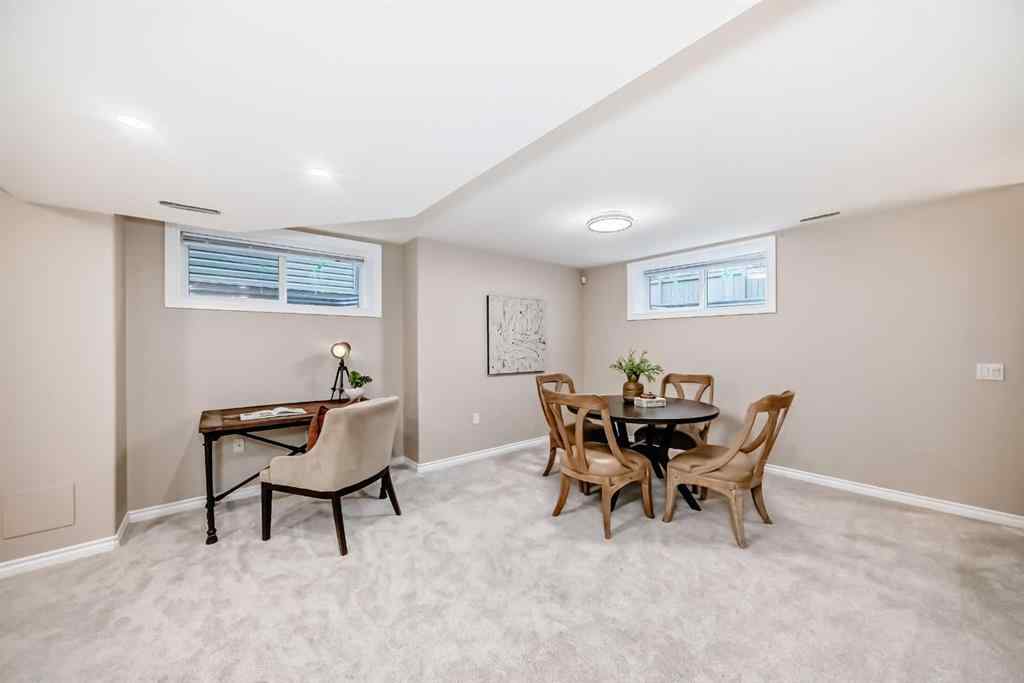 MLS® A2246251 - Unit #105 100 Coopers Common SW in Coopers Crossing Airdrie, Residential