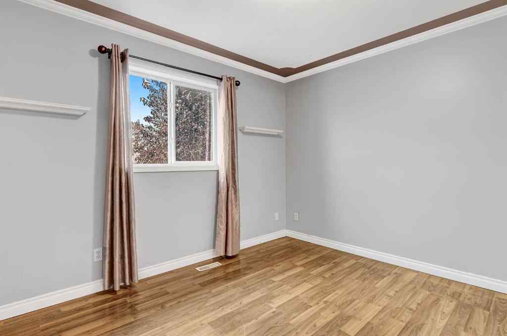 MLS® A2246291 - 10422 72 Avenue  in Mission Heights Grande Prairie, Residential
