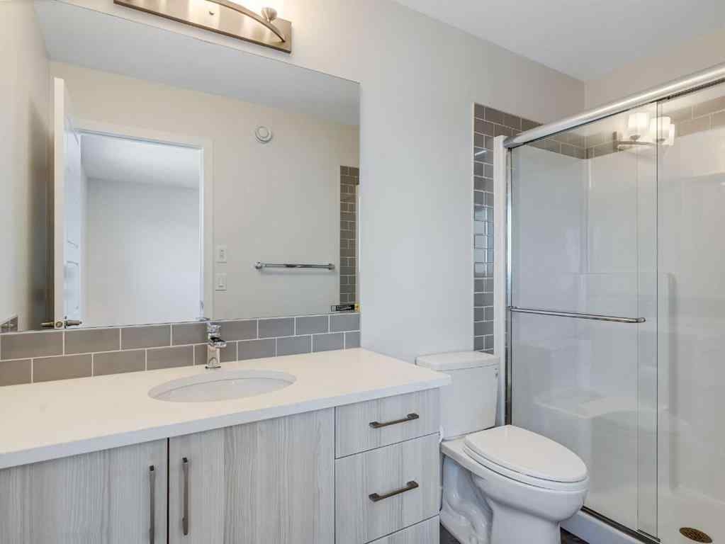 MLS® A2246304 - 235 Aquila Way NW in Glacier Ridge Calgary, Residential