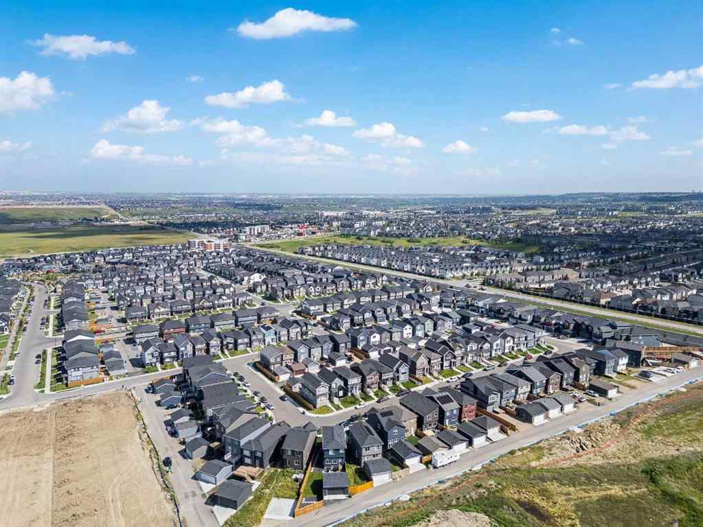 MLS® A2246304 - 235 Aquila Way NW in Glacier Ridge Calgary, Residential