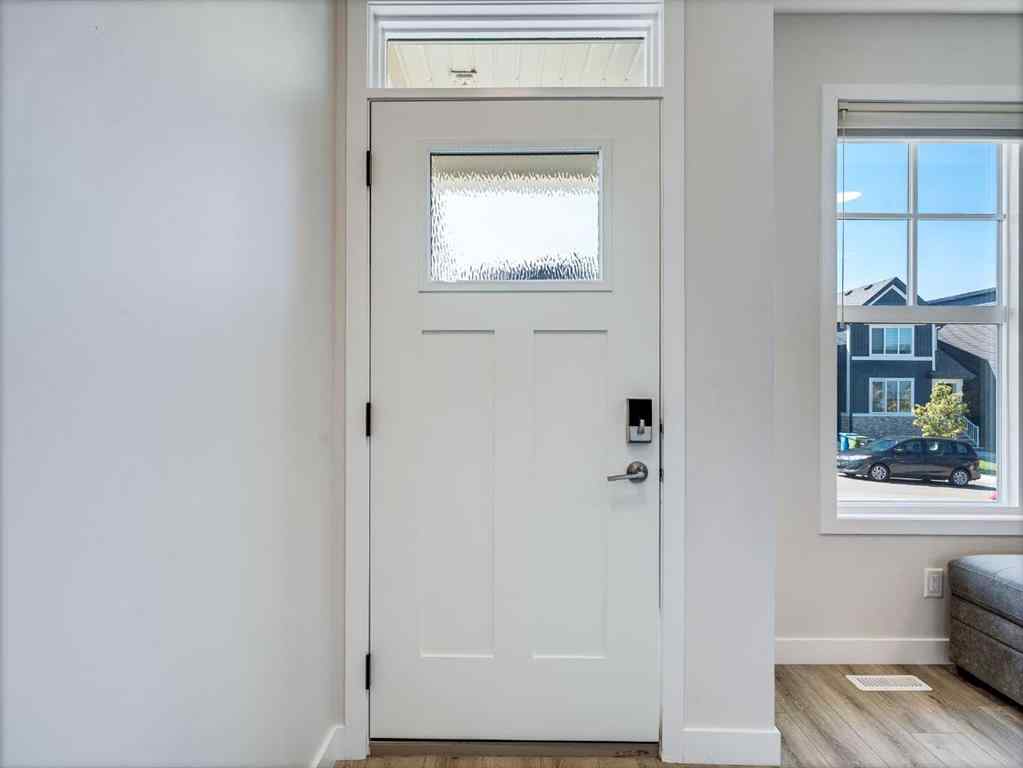 MLS® A2246304 - 235 Aquila Way NW in Glacier Ridge Calgary, Residential