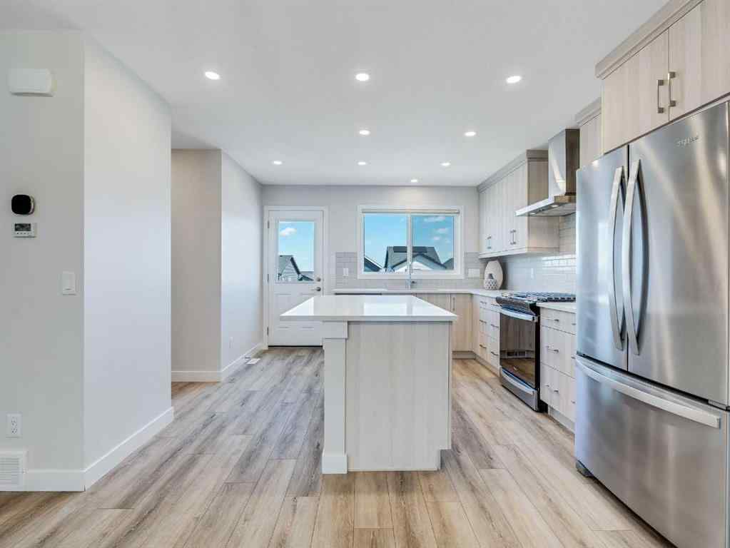 MLS® A2246304 - 235 Aquila Way NW in Glacier Ridge Calgary, Residential