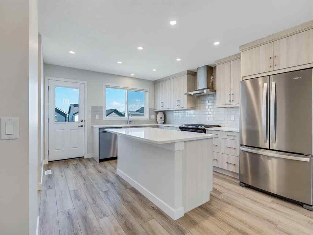 MLS® A2246304 - 235 Aquila Way NW in Glacier Ridge Calgary, Residential