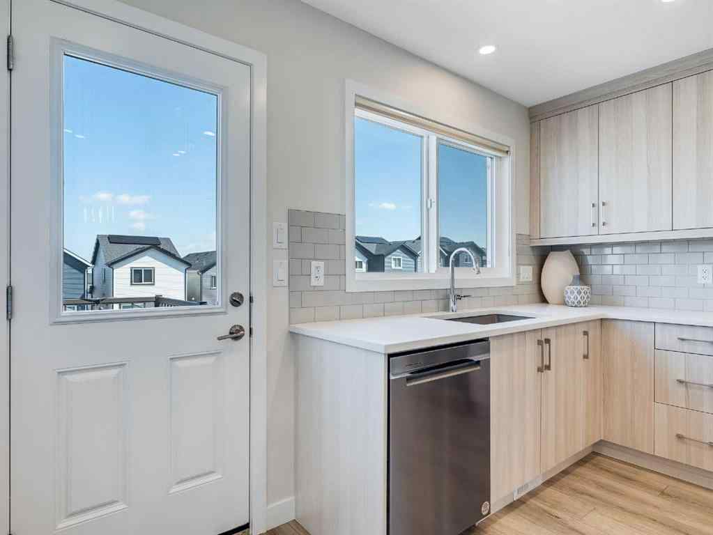 MLS® A2246304 - 235 Aquila Way NW in Glacier Ridge Calgary, Residential