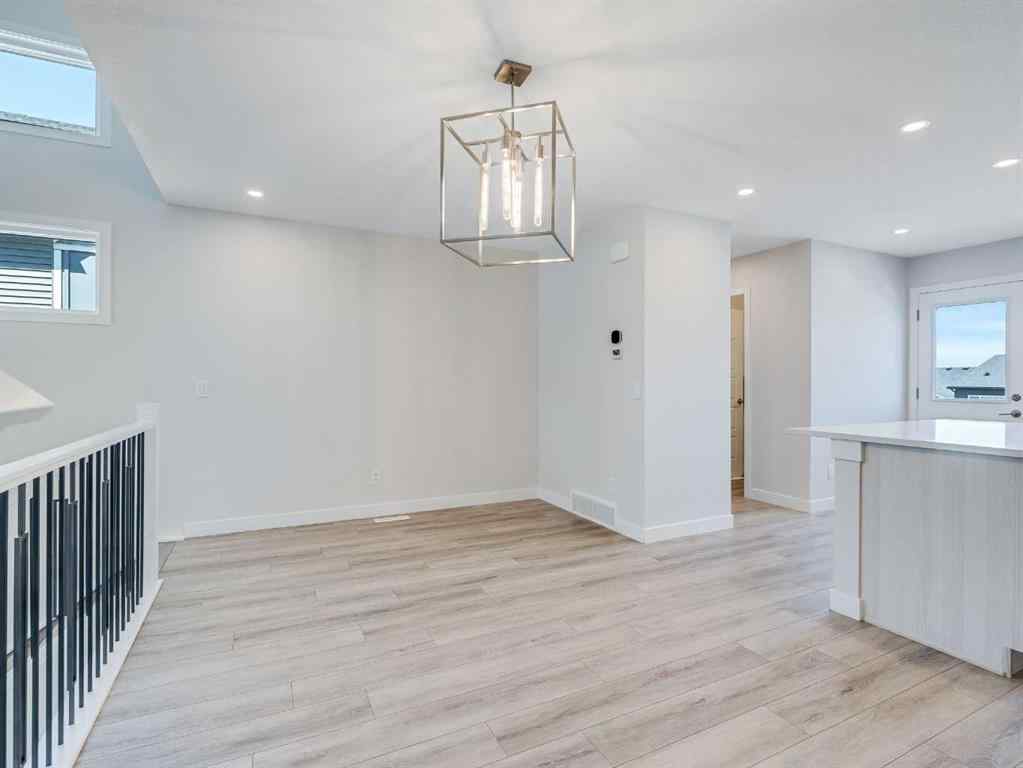 MLS® A2246304 - 235 Aquila Way NW in Glacier Ridge Calgary, Residential