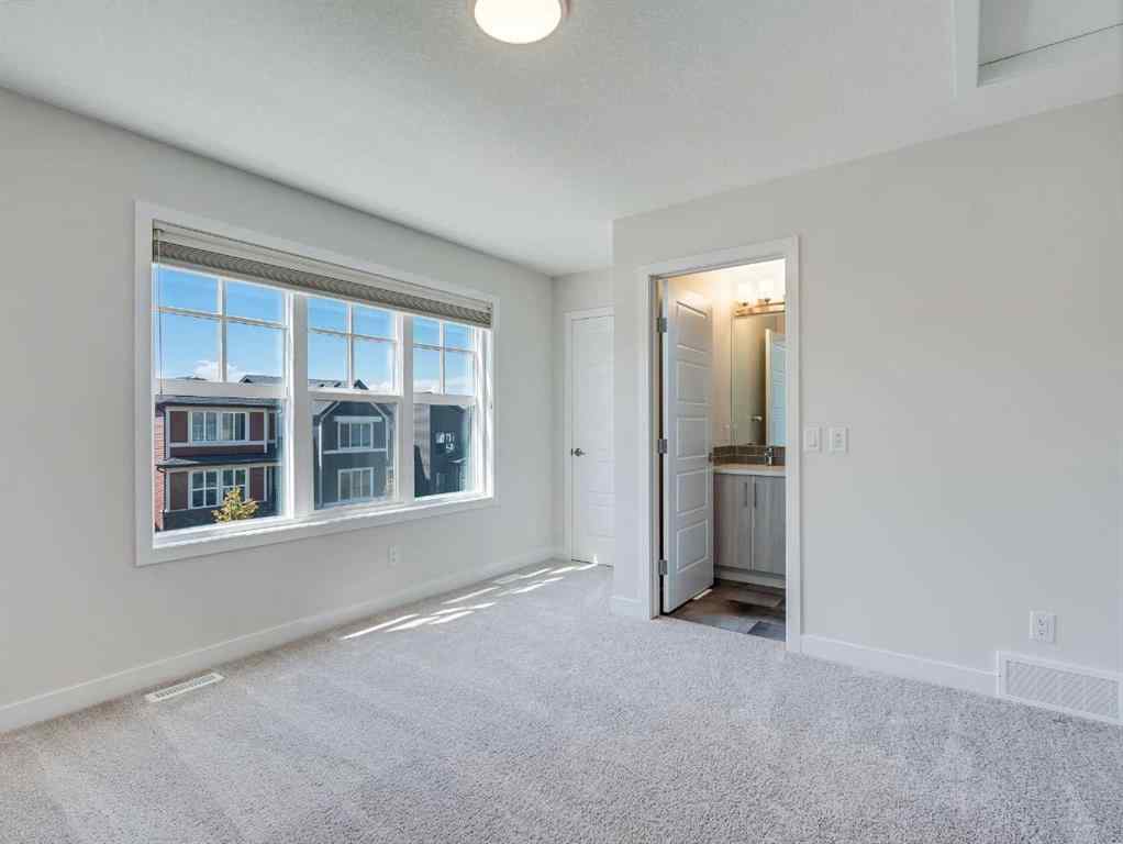 MLS® A2246304 - 235 Aquila Way NW in Glacier Ridge Calgary, Residential