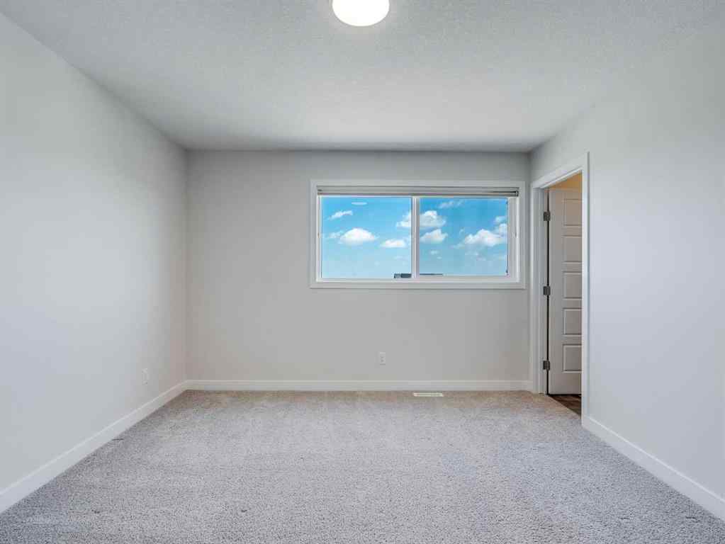 MLS® A2246304 - 235 Aquila Way NW in Glacier Ridge Calgary, Residential