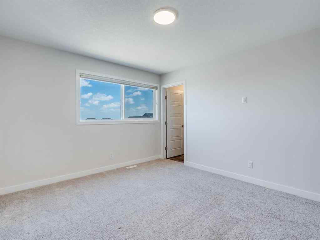 MLS® A2246304 - 235 Aquila Way NW in Glacier Ridge Calgary, Residential