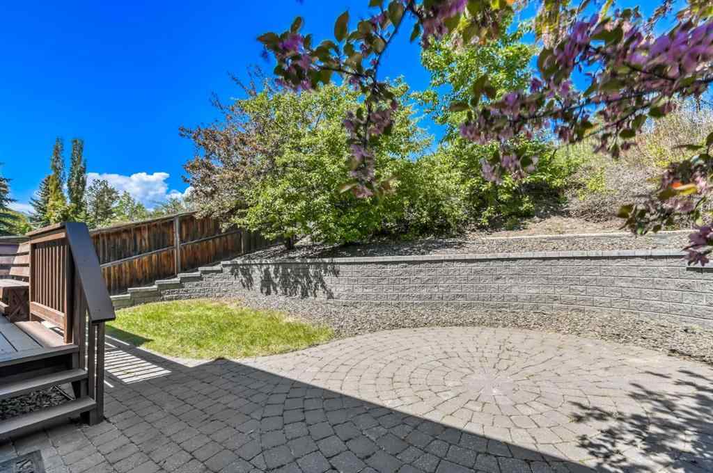 MLS® A2246312 - 91 Springbluff Boulevard SW in Springbank Hill Calgary, Residential