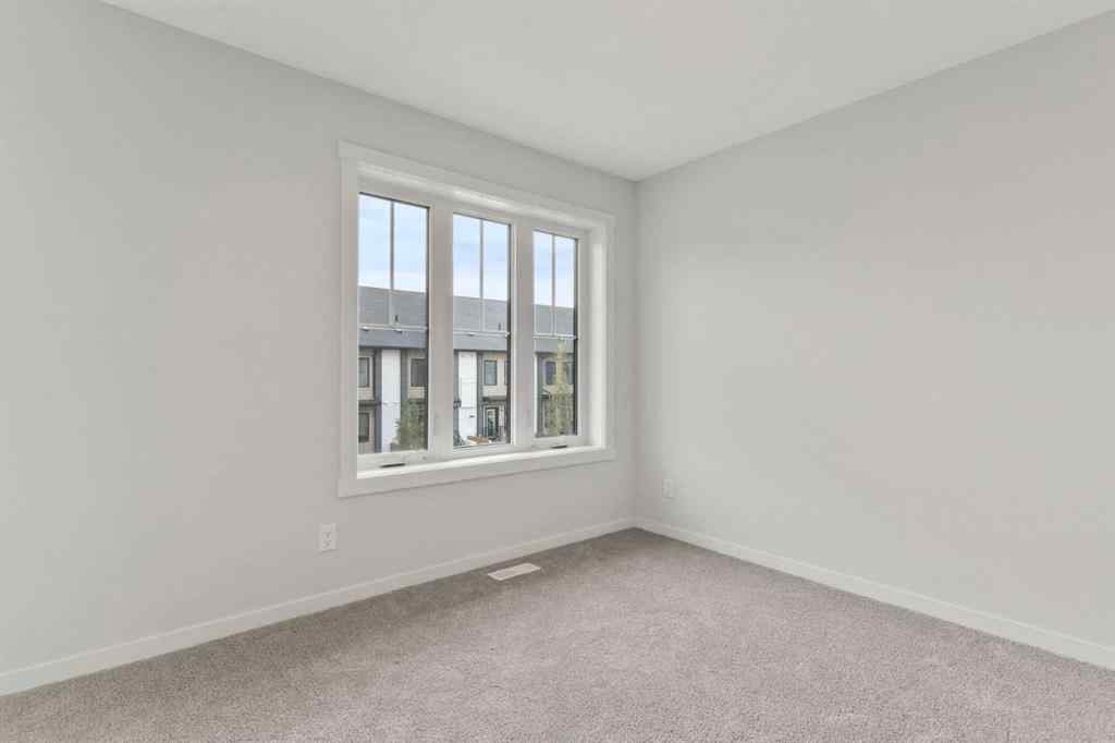 MLS® A2246340 - Unit #114 40 Livingston Parade NE in Livingston Calgary, Residential