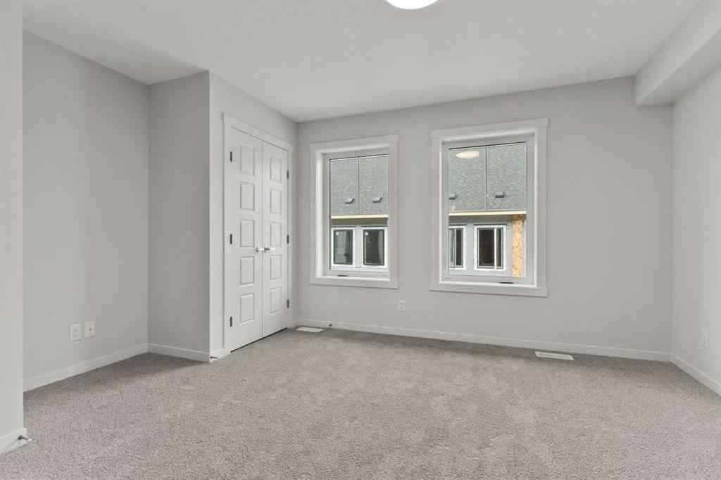 MLS® A2246340 - Unit #114 40 Livingston Parade NE in Livingston Calgary, Residential