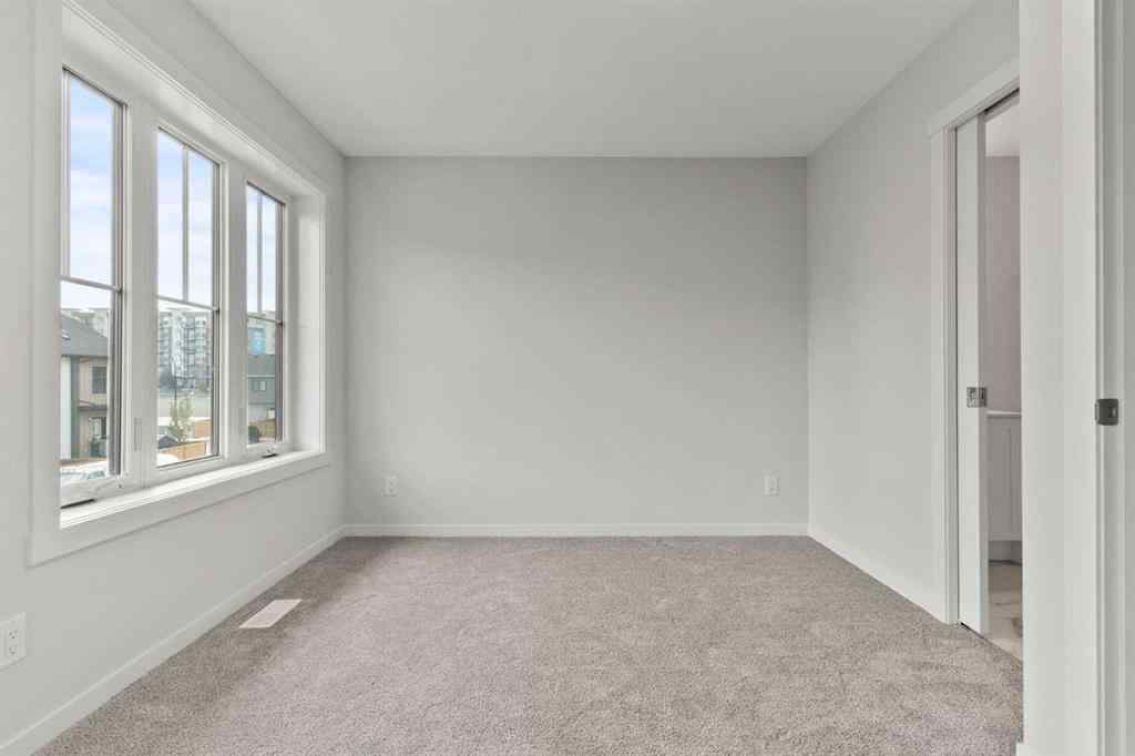 MLS® A2246340 - Unit #114 40 Livingston Parade NE in Livingston Calgary, Residential