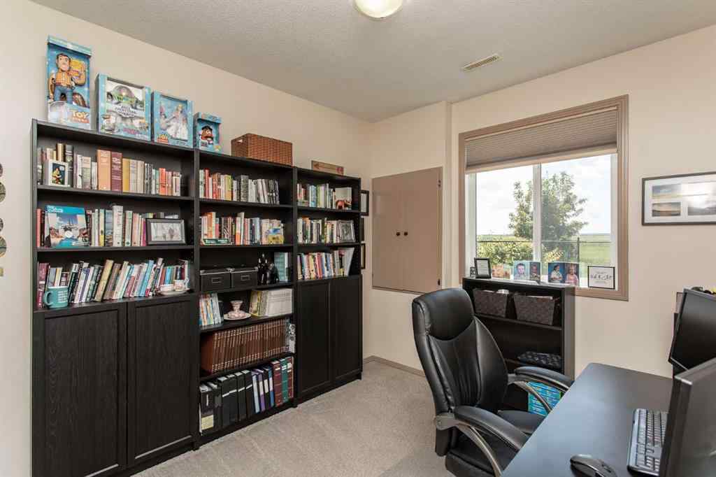 MLS® A2246359 - Unit #22 4546 Iron Wolf Place  in Iron Wolf Lacombe, Residential