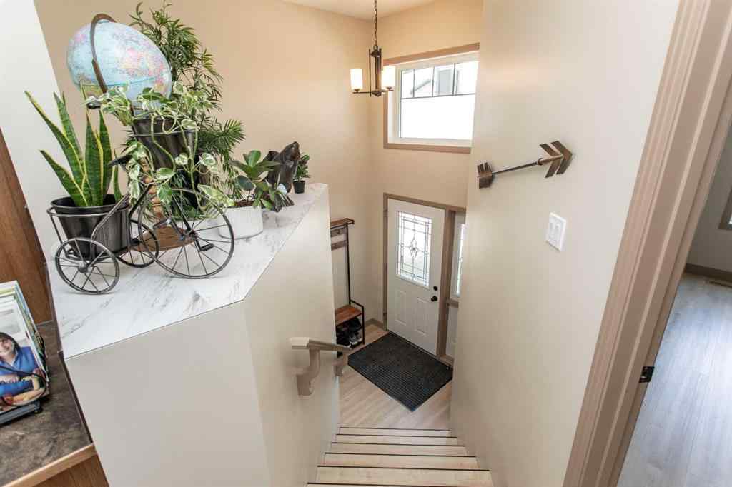 MLS® A2246359 - Unit #22 4546 Iron Wolf Place  in Iron Wolf Lacombe, Residential