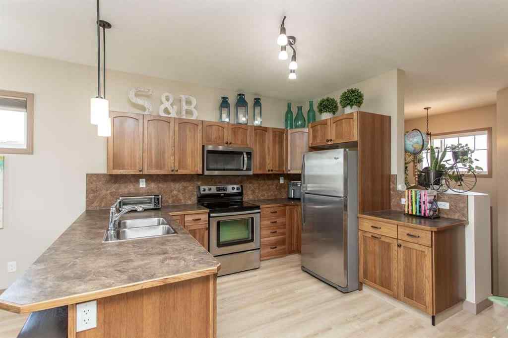 MLS® A2246359 - Unit #22 4546 Iron Wolf Place  in Iron Wolf Lacombe, Residential