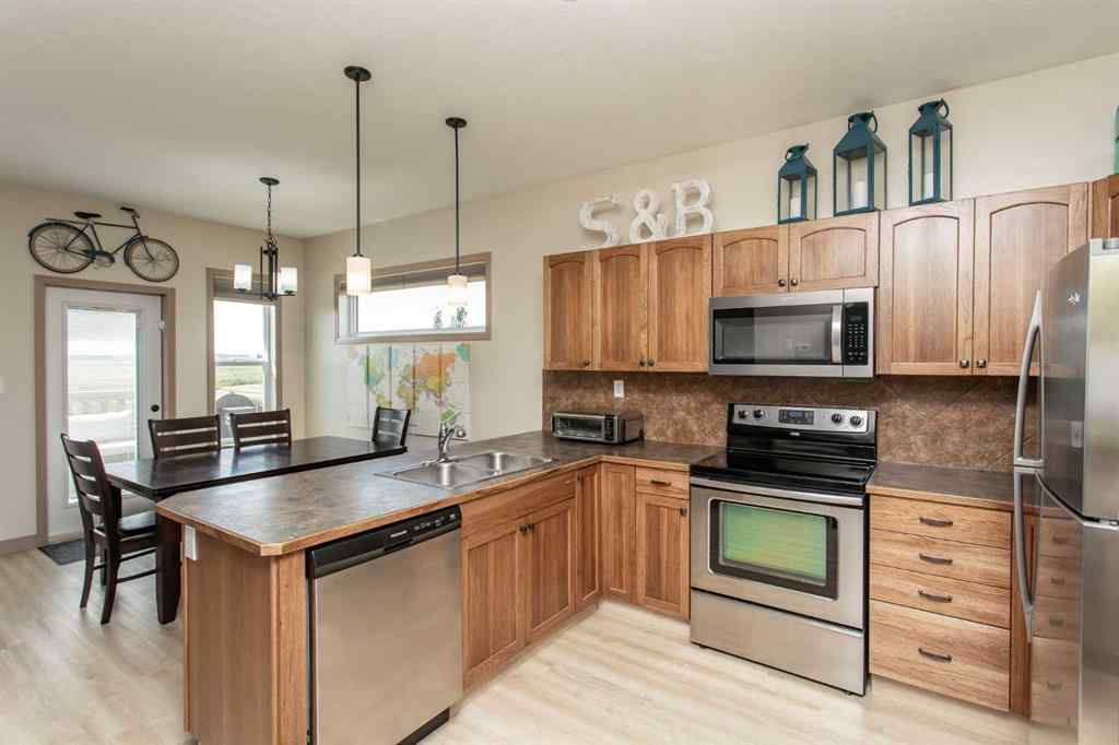 MLS® A2246359 - Unit #22 4546 Iron Wolf Place  in Iron Wolf Lacombe, Residential