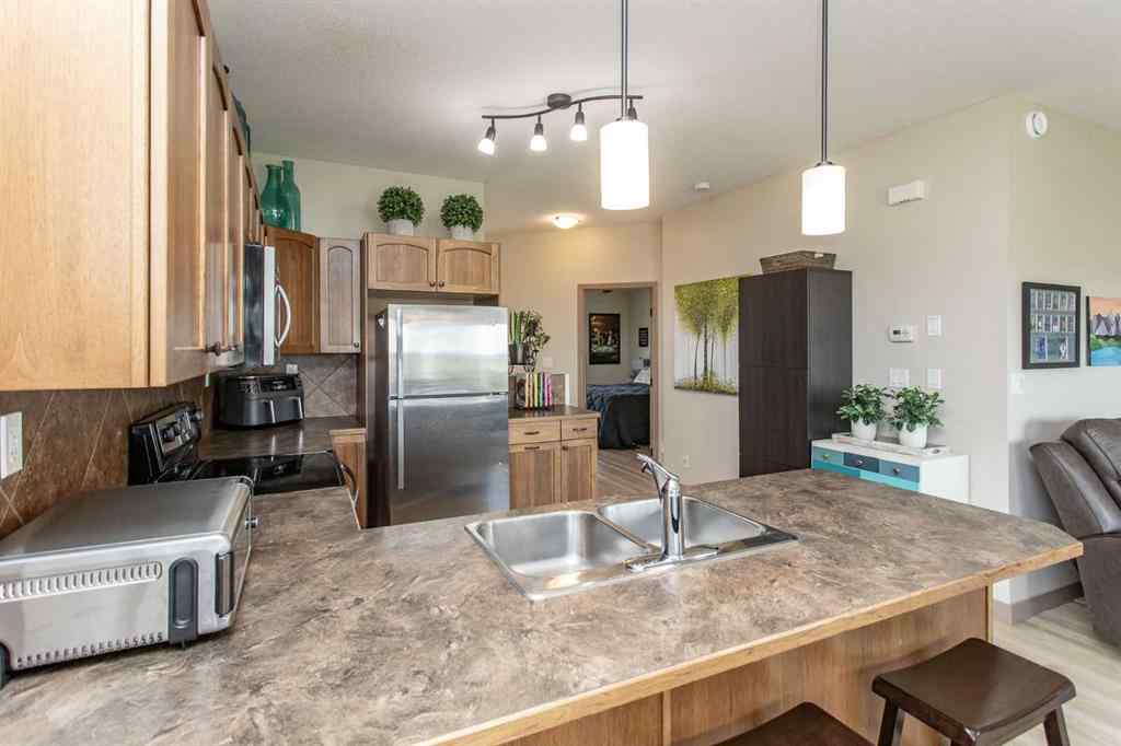 MLS® A2246359 - Unit #22 4546 Iron Wolf Place  in Iron Wolf Lacombe, Residential