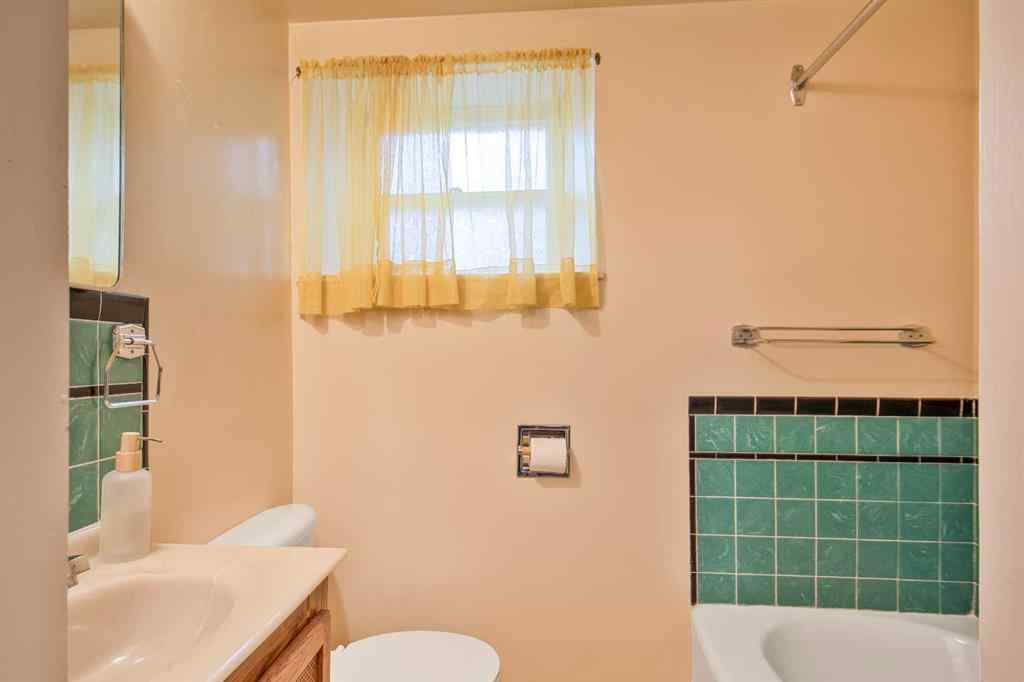 MLS® A2246372 - 10007 92 Avenue  in Swanavon Grande Prairie, Residential