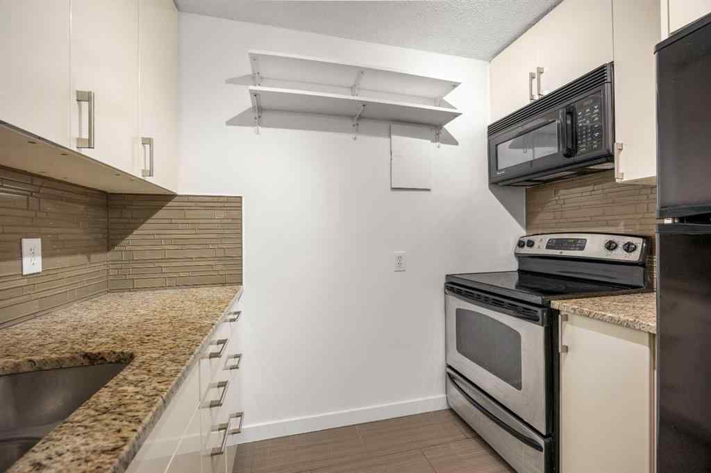 MLS® A2246373 - Unit #413 4944 Dalton Drive NW in Dalhousie Calgary, Residential