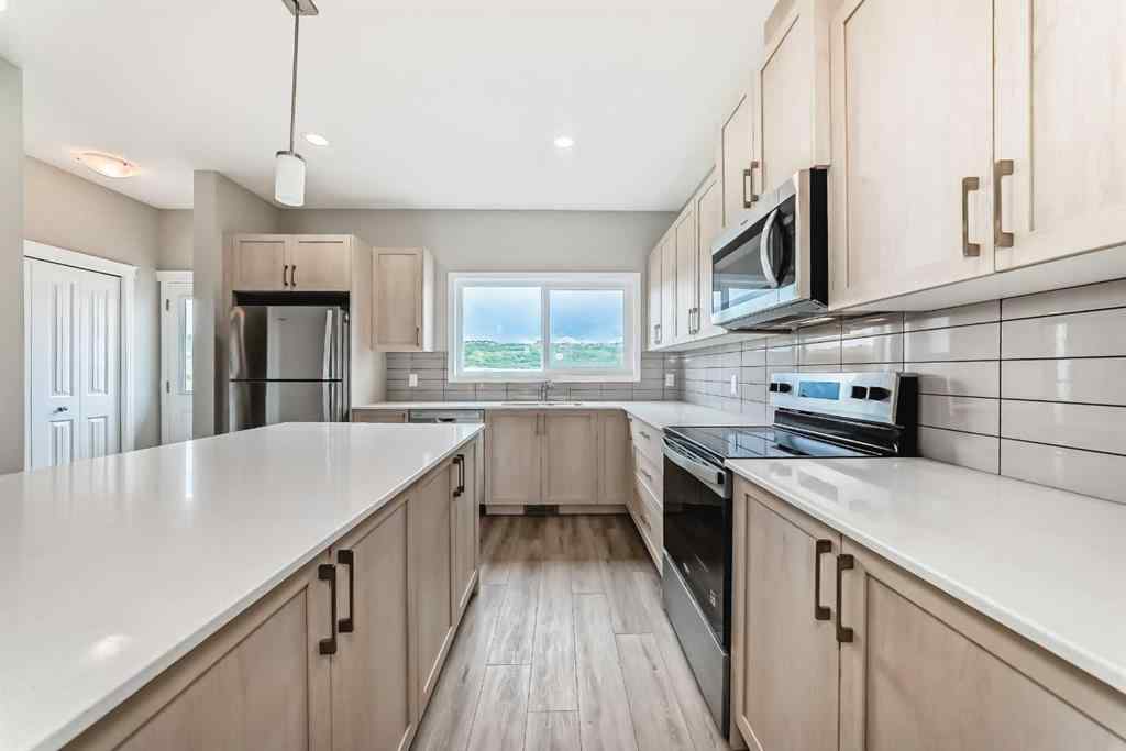 MLS® A2246376 - 619 Wolf Willow Boulevard SE in Wolf Willow Calgary, Residential