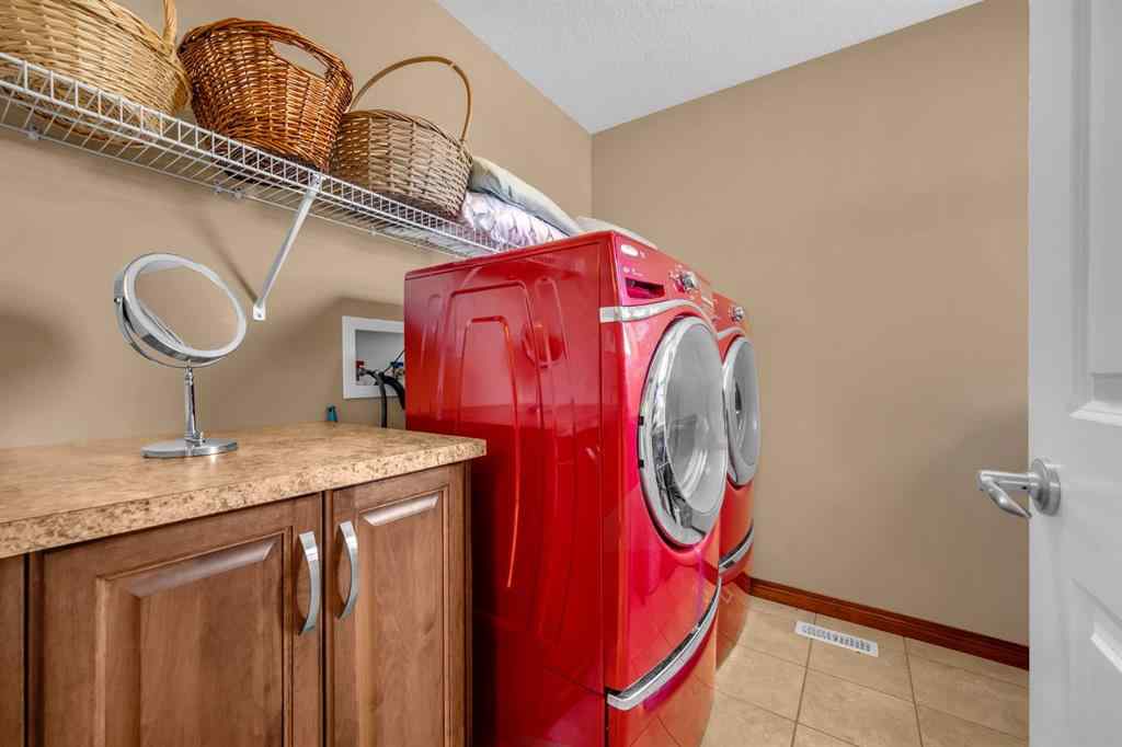 MLS® A2246423 - 1011 Kings Heights Road SE in Kings Heights Airdrie, Residential