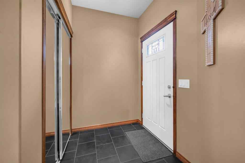 MLS® A2246423 - 1011 Kings Heights Road SE in Kings Heights Airdrie, Residential