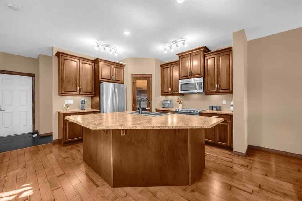 MLS® A2246423 - 1011 Kings Heights Road SE in Kings Heights Airdrie, Residential