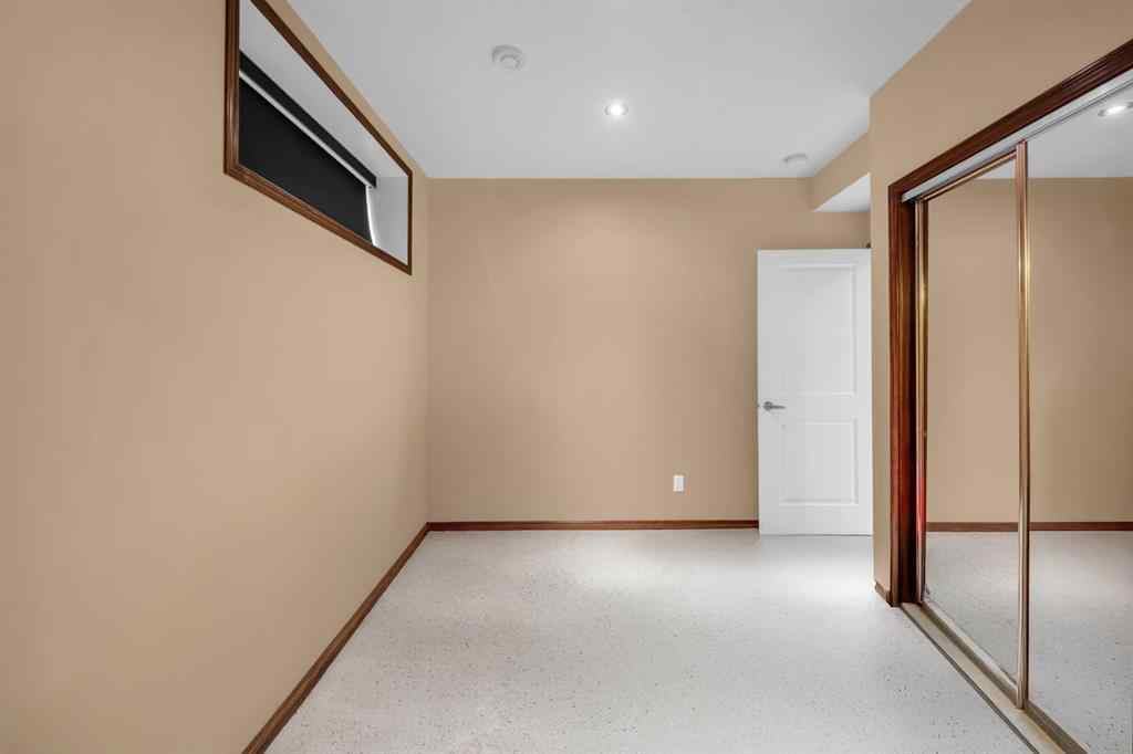 MLS® A2246423 - 1011 Kings Heights Road SE in Kings Heights Airdrie, Residential