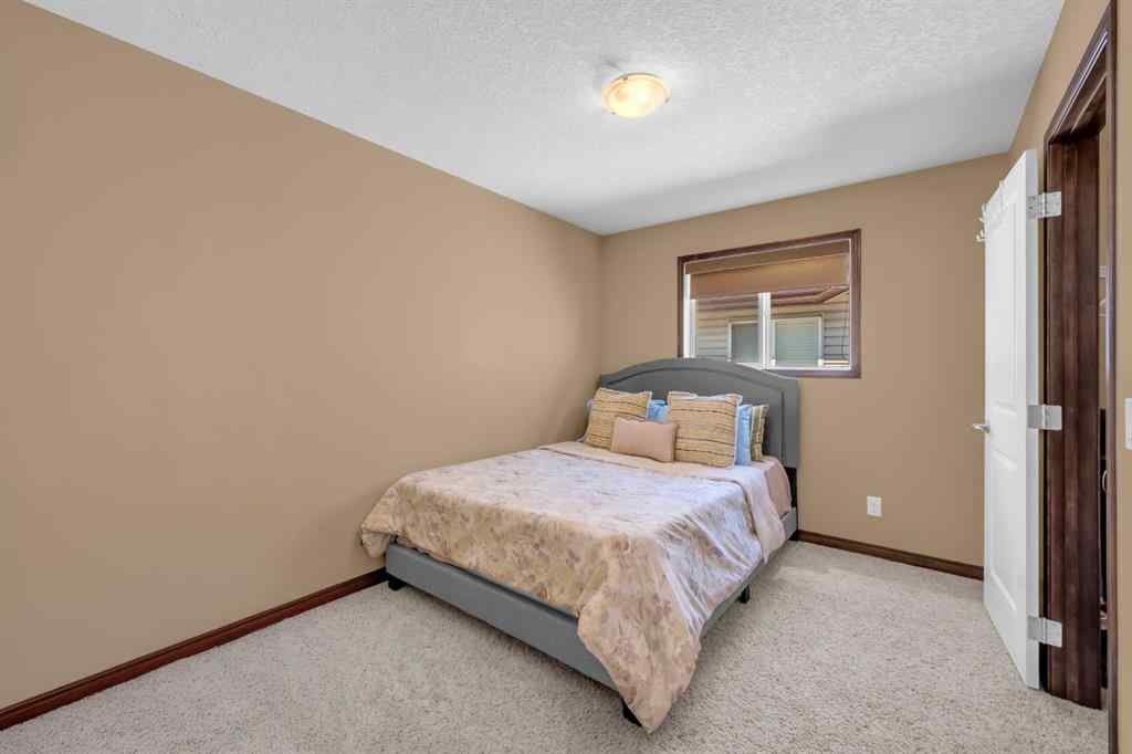 MLS® A2246423 - 1011 Kings Heights Road SE in Kings Heights Airdrie, Residential